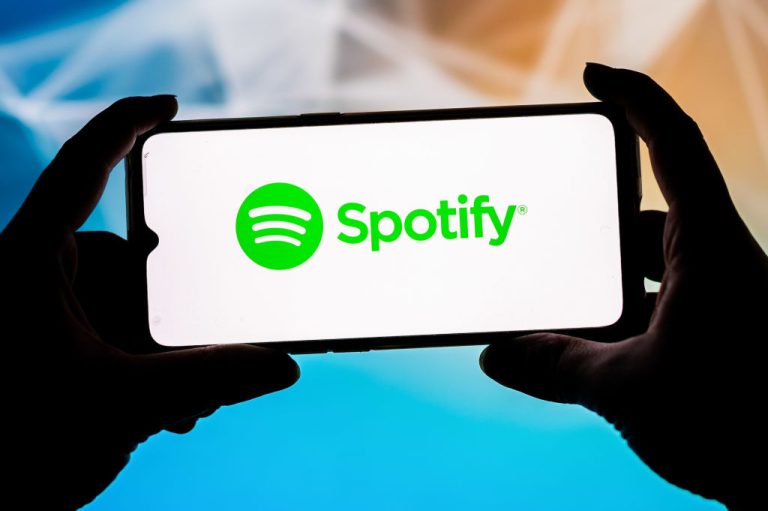 In This Photo Illustration A Spotify Logo Seen Displayed On