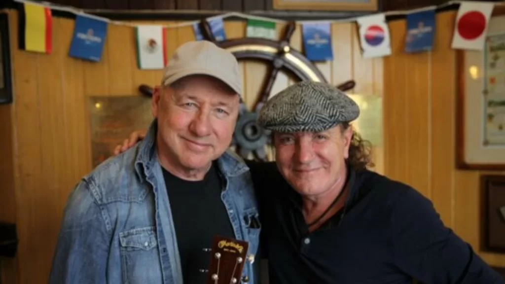 Brian Johnson y Mark Knopfler